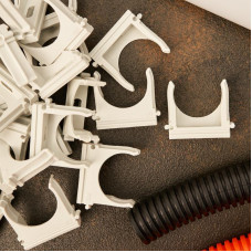 Крепеж-клипса для труб ø32мм, серая (100 шт/уп) REXANT